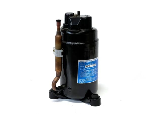 A black compressor with a brown hose attached to it.