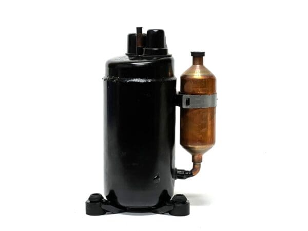 A black and brown air compressor on top of a white table.