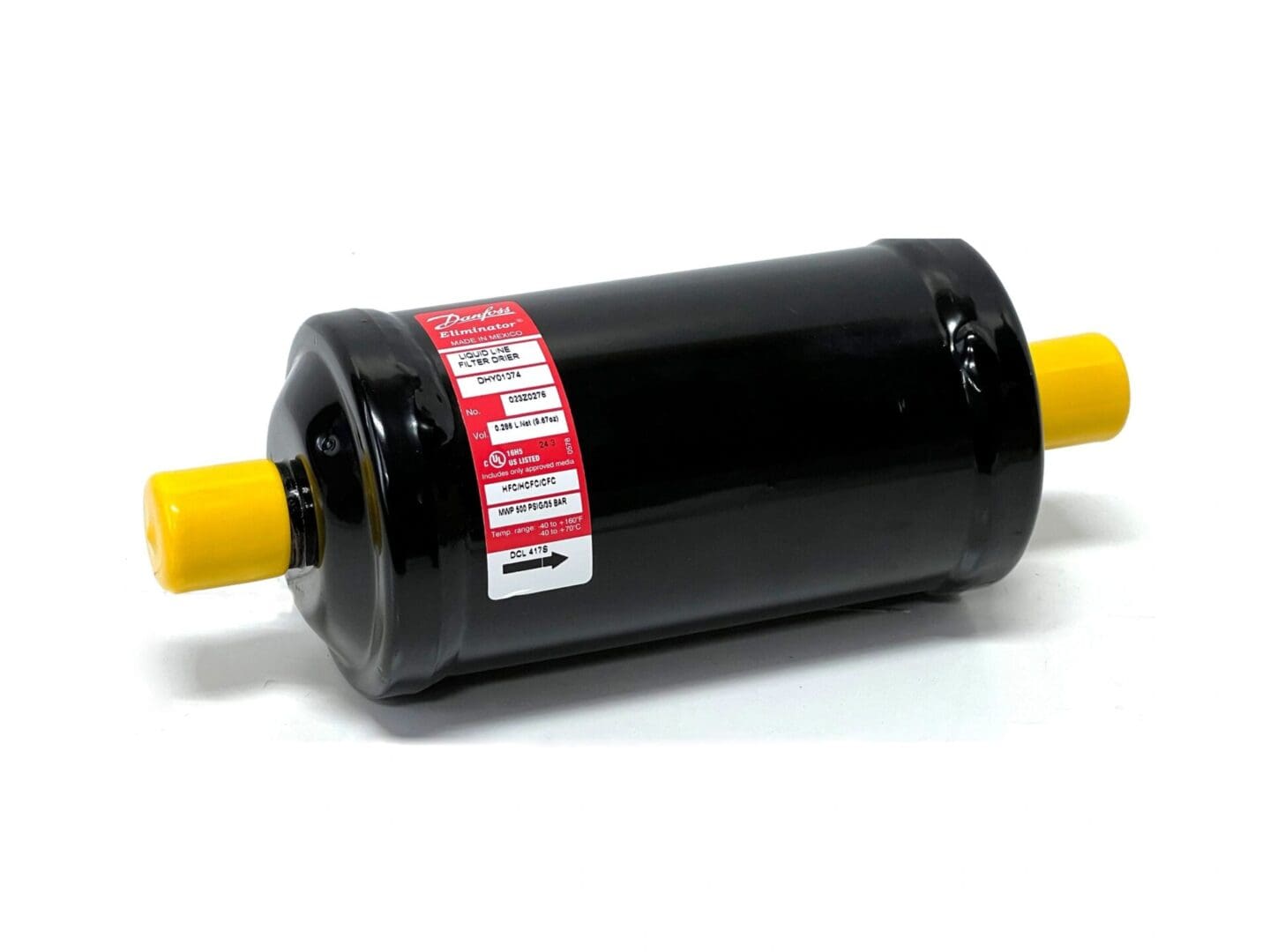 A black and yellow motor is on the ground