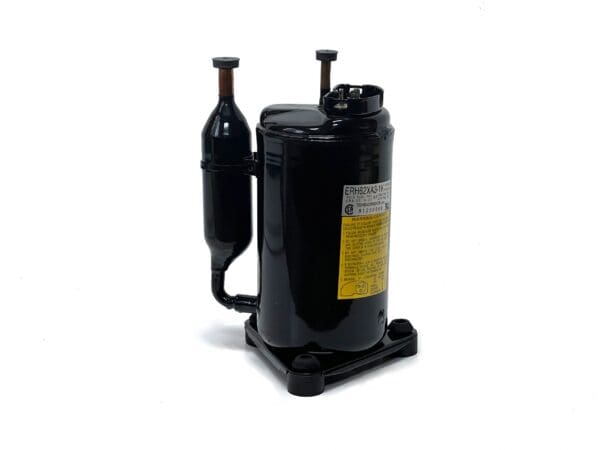 A black compressor with two bottles on top of it.
