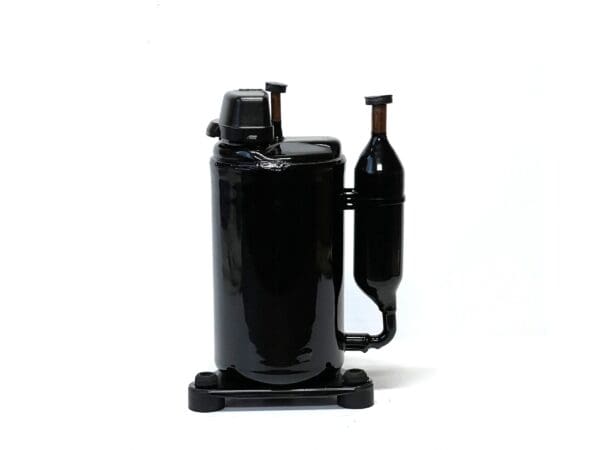 A black bottle and can holder on the side of a table.