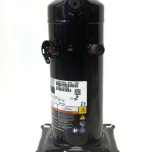 Black refrigeration compressor on metal mounting base