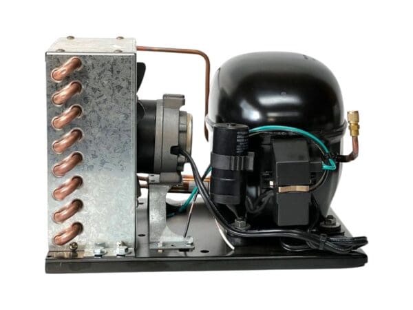 A compressor is connected to the side of a black box.
