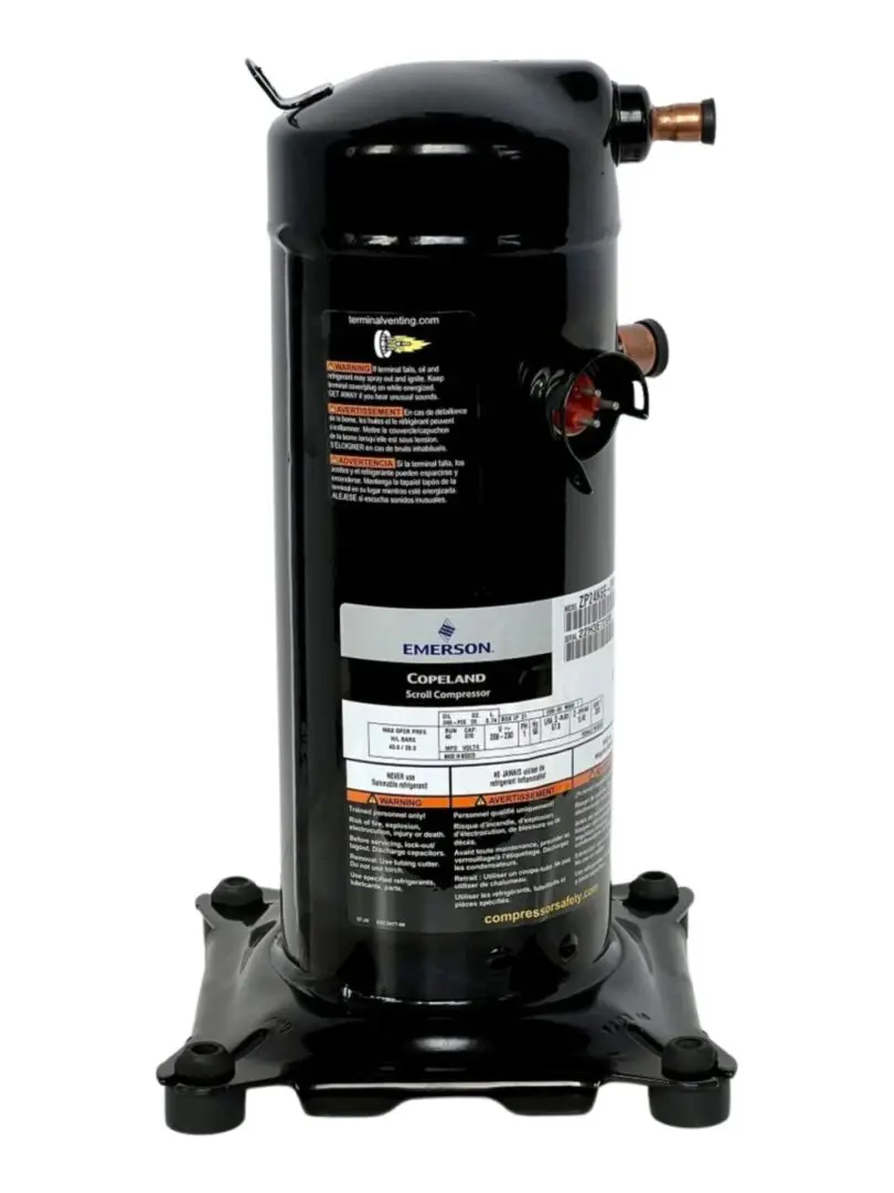 A black compressor is sitting on top of a base.