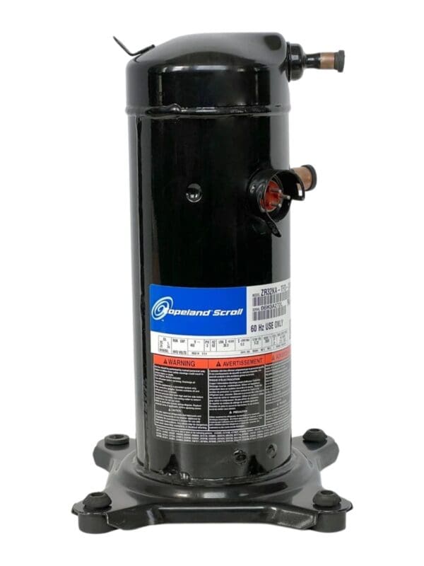 A black compressor with blue and white writing on it.