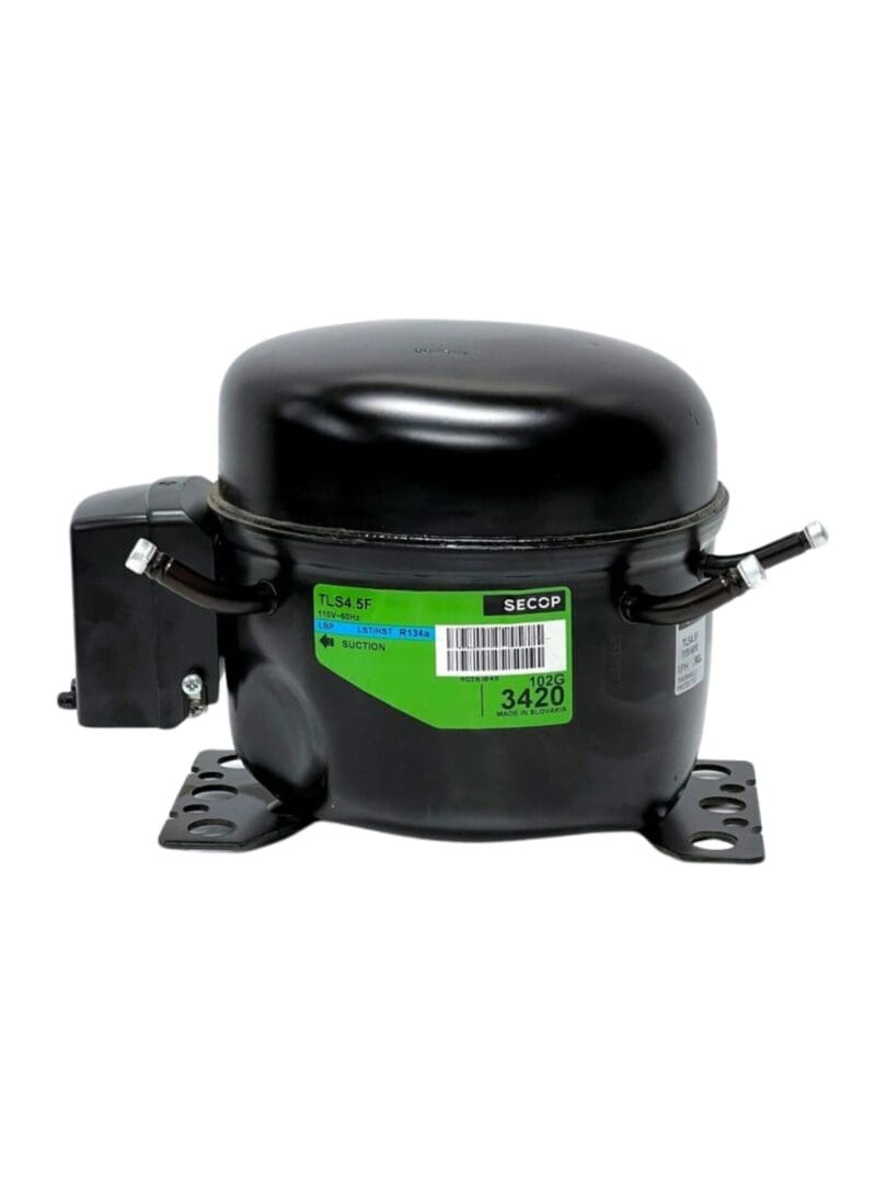 A black compressor with green label on it.