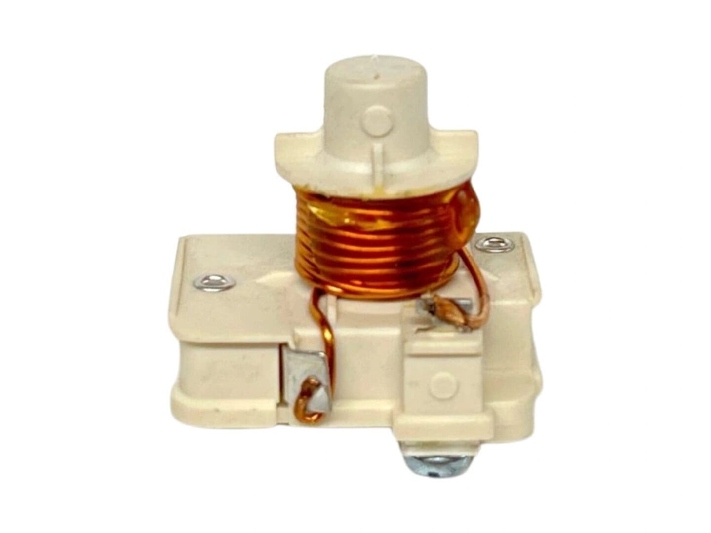 A white and orange coil is attached to the side of an electrical box.