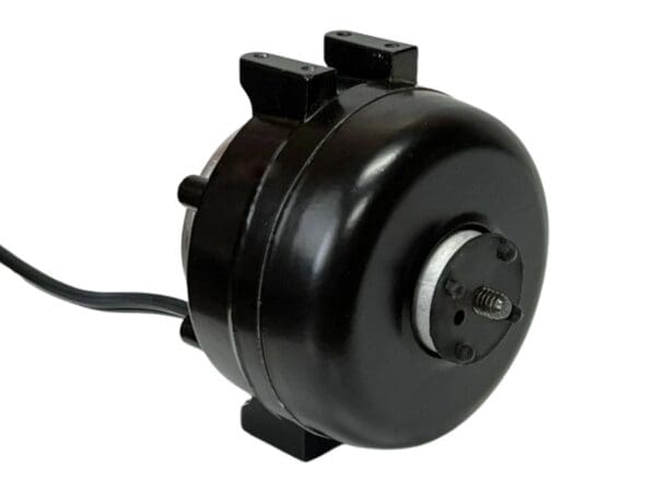 A black motor with a wire attached to it.