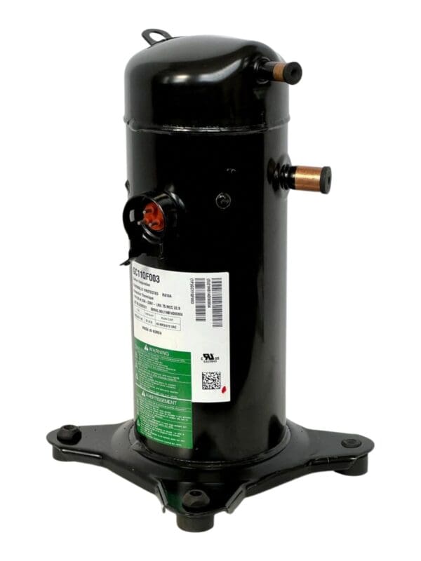 A black compressor sitting on top of a metal stand.