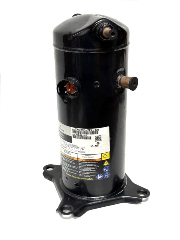 Black cylindrical refrigeration compressor on white background.